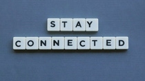 ' Stay Connected ' word made of square letter word on grey background. ' Stay Connected ' word made of square letter word on grey background.