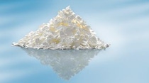 Small mountain of small white flaky powder  Small mountain of small white flaky powder