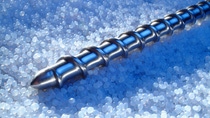 End of screw on top of small white beaded material  End of screw on top of small white beaded material