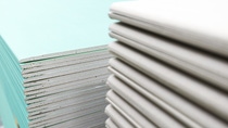 The stack of gypsum board preparing for construction The stack of gypsum board preparing for construction