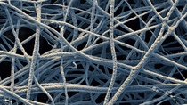 Clothes with UV protection, gas sensor components or laptop casings – there are a wide variety of applications for these tiny fibers. Currently, however, inorganic nanofibers are still being researched in Ludwigshafen. What’s so special about them? With a diameter of less than 300 nanometers, they are a thousand times finer than a human hair. That means they are no longer visible under a normal optical microscope.       Magnification 7 000 :1 (12cm in width) Clothes with UV protection, gas sensor components or laptop casings – there are a wide variety of applications for these tiny fibers. Currently, however, inorganic nanofibers are still being researched in Ludwigshafen. What’s so special about them? With a diameter of less than 300 nanometers, they are a thousand times finer than a human hair. That means they are no longer visible under a normal optical microscope.       Magnification 7 000 :1 (12cm in width)