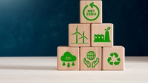 Net zero carbon emissions and carbon neutral concept. Wooden cubes with net zero icons of renewable energy, co2 emissions reduction, green production and waste recycling. Net zero carbon emissions and carbon neutral concept. Wooden cubes with net zero icons of renewable energy, co2 emissions reduction, green production and waste recycling.