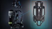 The carrier plate of the MSA M1 breathing apparatus is made from Ultramid® A3XZC3 ESD - a highly impact modified, carbon fiber reinforced plastic with V 0 flame retardancy from 1.5 mm, reduced surface resistivity for more safety in EX zones, and high mechanical stability - the handle of the carrier plate is rated for emergency loads up to 200 kg.
Photo: BASF The carrier plate of the MSA M1 breathing apparatus is made from Ultramid® A3XZC3 ESD - a highly impact modified, carbon fiber reinforced plastic with V 0 flame retardancy from 1.5 mm, reduced surface resistivity for more safety in EX zones, and high mechanical stability - the handle of the carrier plate is rated for emergency loads up to 200 kg.
Photo: BASF