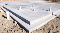 Picture of a concrete slab for a house.  Taken during the early morning. Picture of a concrete slab for a house.  Taken during the early morning.