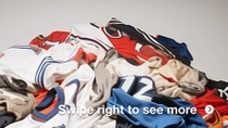 Pile of used sports jerseys   Pile of used sports jerseys