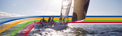 People on a sailing boat in the ocean, under a bright sky, surrounded by a key visual of four lines in blue, orange, green and red (photoshopped)