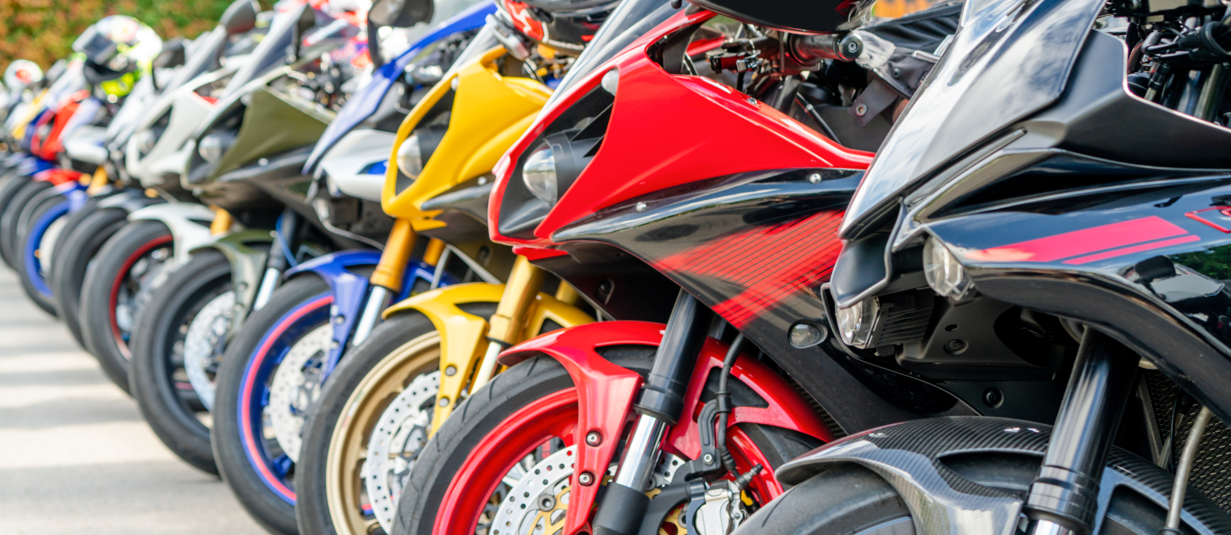 Motorcycles group parking on city street during adventure journey. Motorcyclists community travel concept.; Shutterstock ID 1228339180; Purchase Order: 4958024353; Job: Christiane Weiser-Zimmermann; Client/Licensee: BASF Coatings GmbH; Other: Autorisiert: Frau Christine Waga 