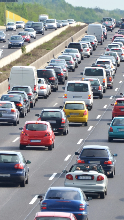 traffic-jam on 4-lane highway at rush-hour