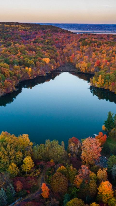 Scenic view of a colorful sunset over a serene lake