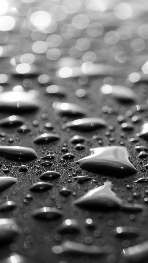 Water drops on metal surface. Abstract background