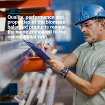 Person inspecting materials in a production setting. Person inspecting materials in a production setting.