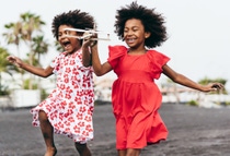 Two African children playing Two African children playing